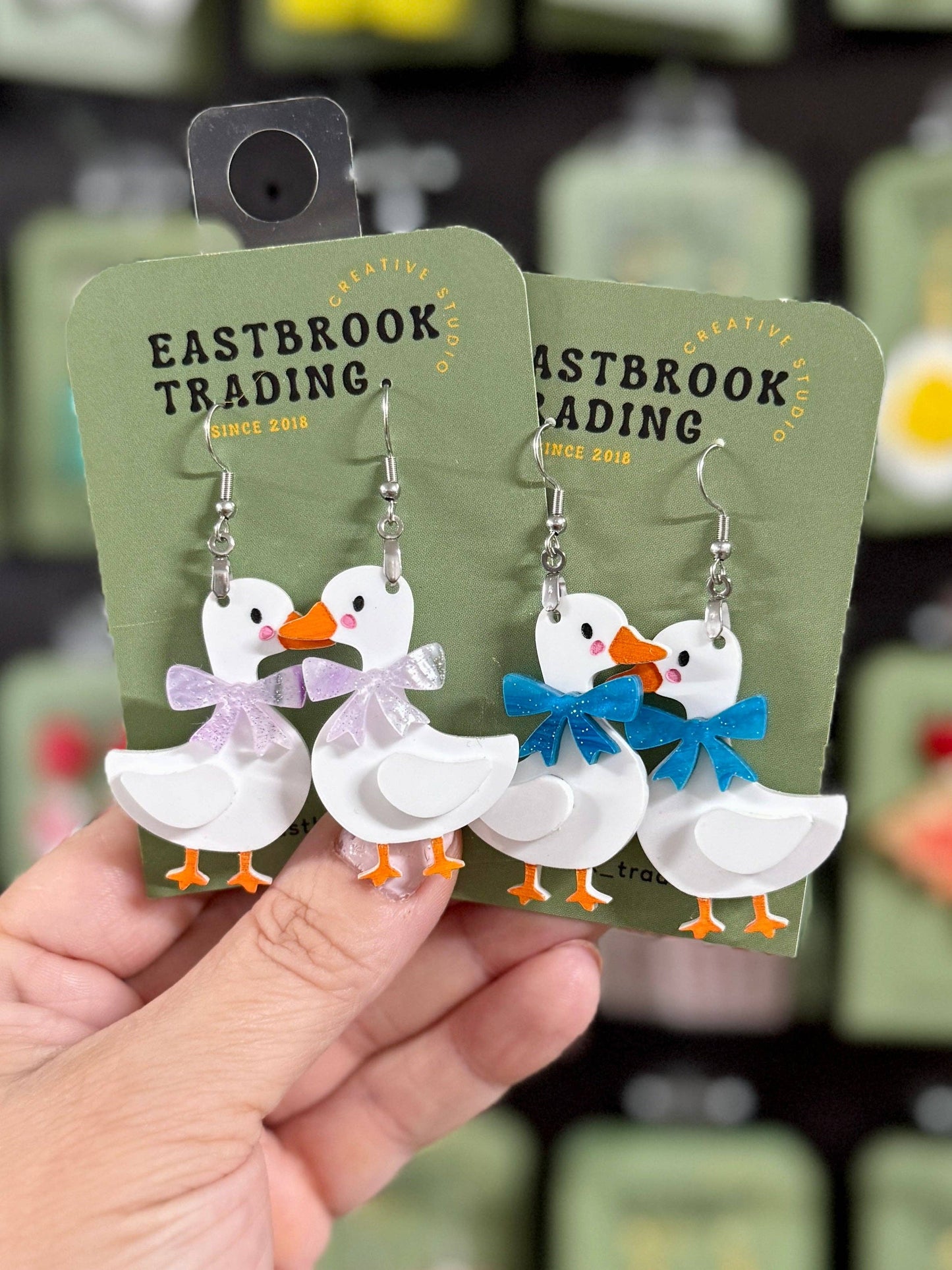 Handmade Vintage goose earrings with pink bow accents