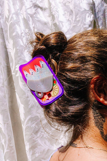 Eco-conscious sardine claw clip styled on hair – playful gift for teens, trendsetters, and friends