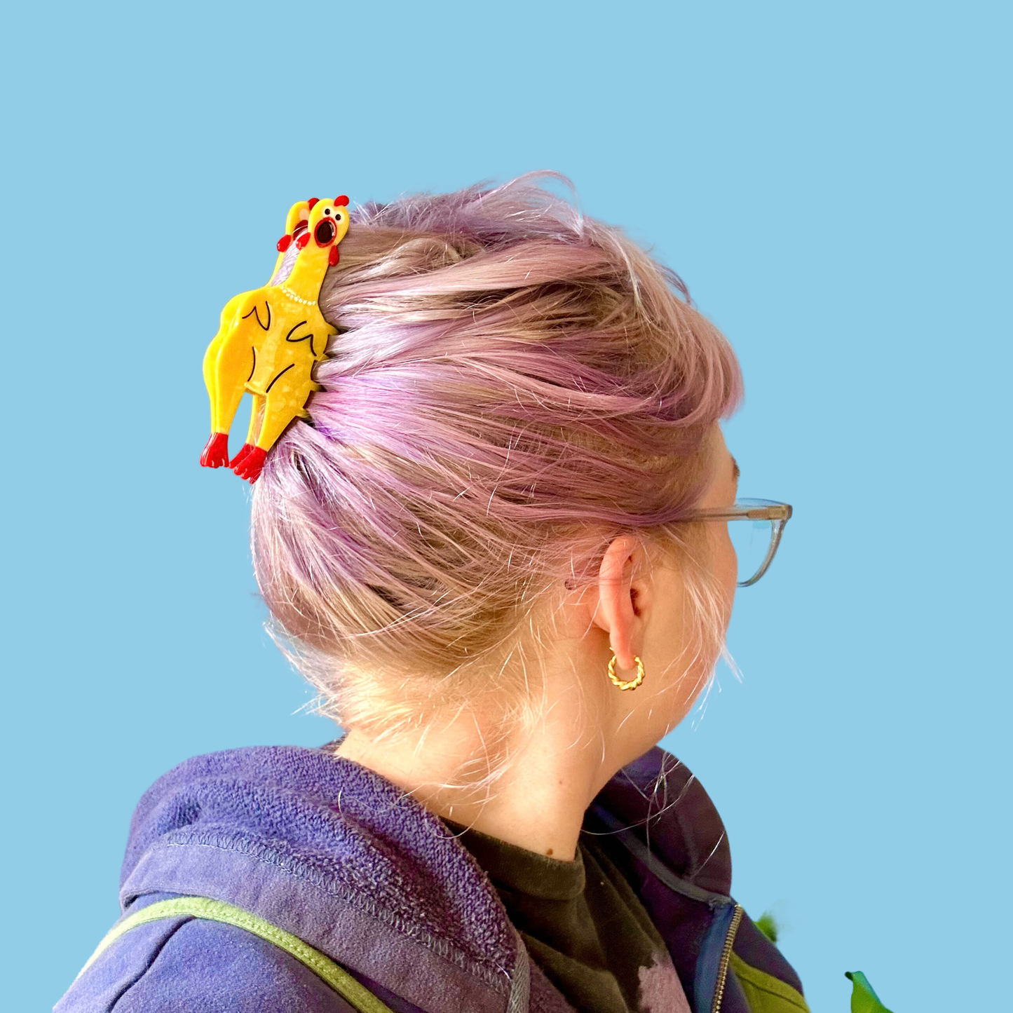 Close-up of chicken-shaped hair claw clip with rhinestone details – playful stocking stuffer or gag gift