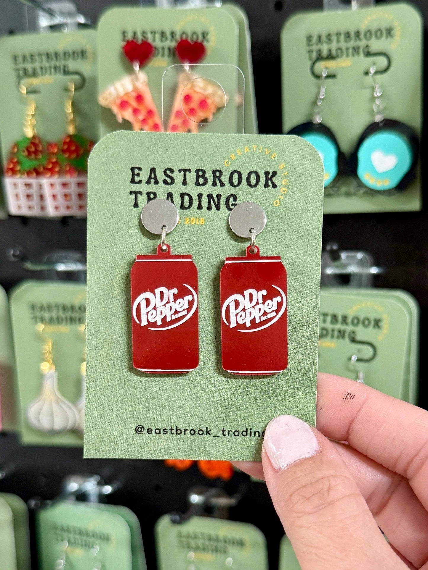 Dr. Pepper-themed earrings perfect for gifts