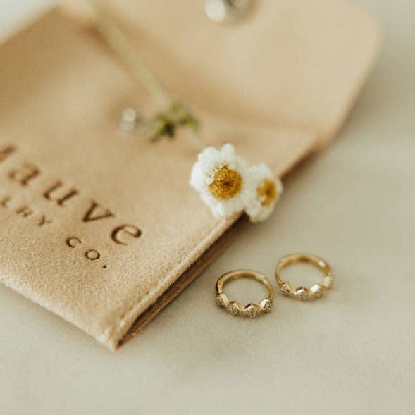 Hypoallergenic gold huggie hoops with diamond accent