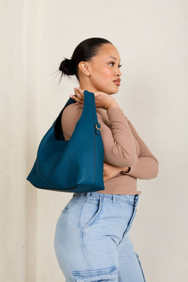 Slouchy everyday hobo bag with inner pocket and zip closure