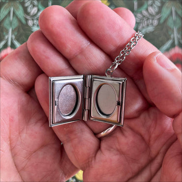 Fantasy romance book necklace with photo-holding locket