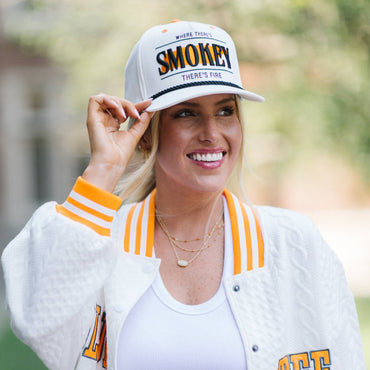 Tennessee-inspired white trucker hat with bold black and orange lettering volunteer gift shop