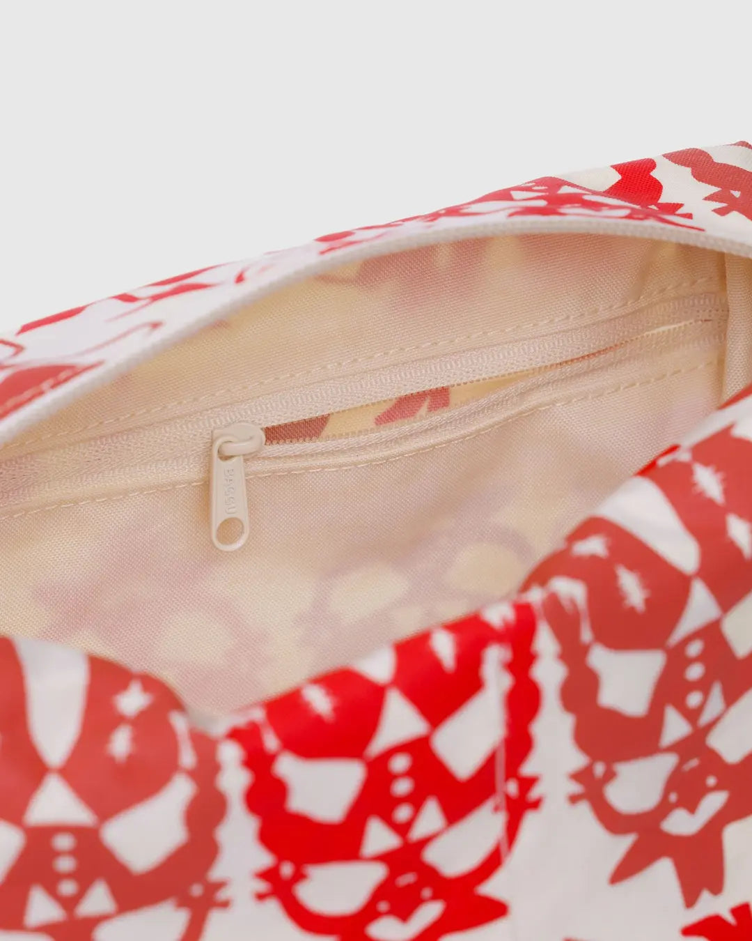 Baggu Dopp kit in Cowgirl print styled with toiletries, a playful and practical gift store favorite