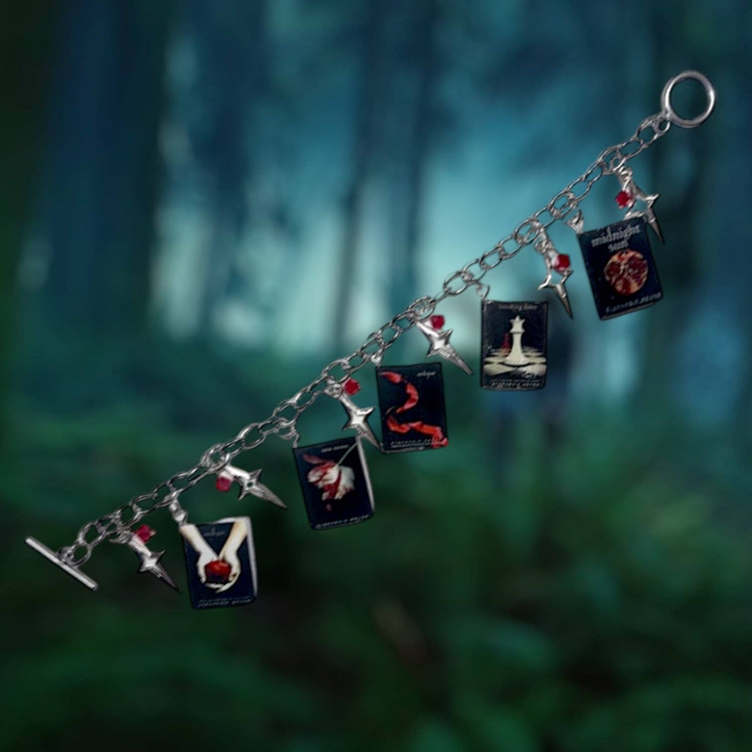 Handmade Twilight bracelet featuring Twilight, New Moon, Eclipse, Breaking Dawn, and Midnight Sun charms. gift store