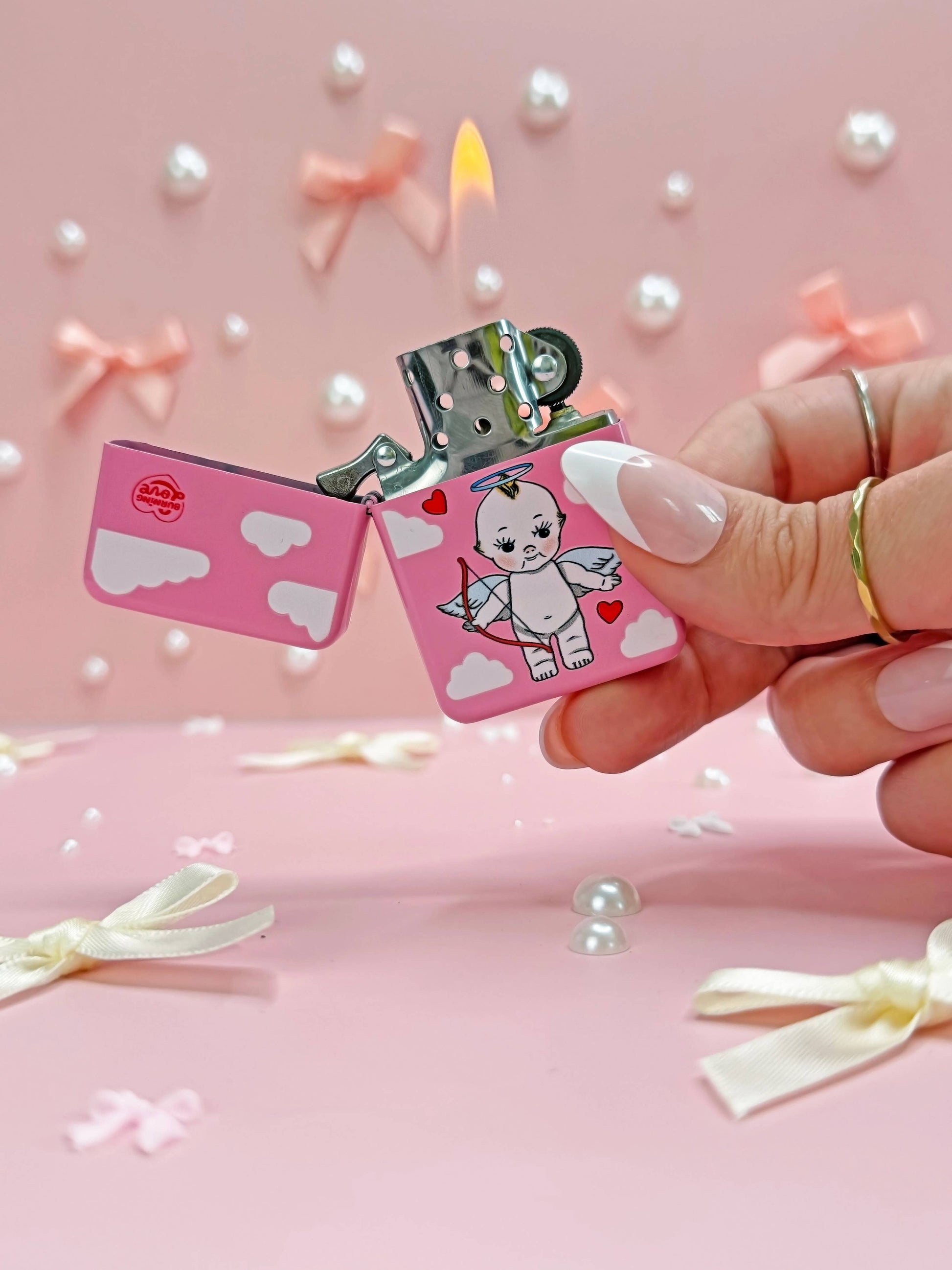 Double-sided refillable lighter with Kewpie design