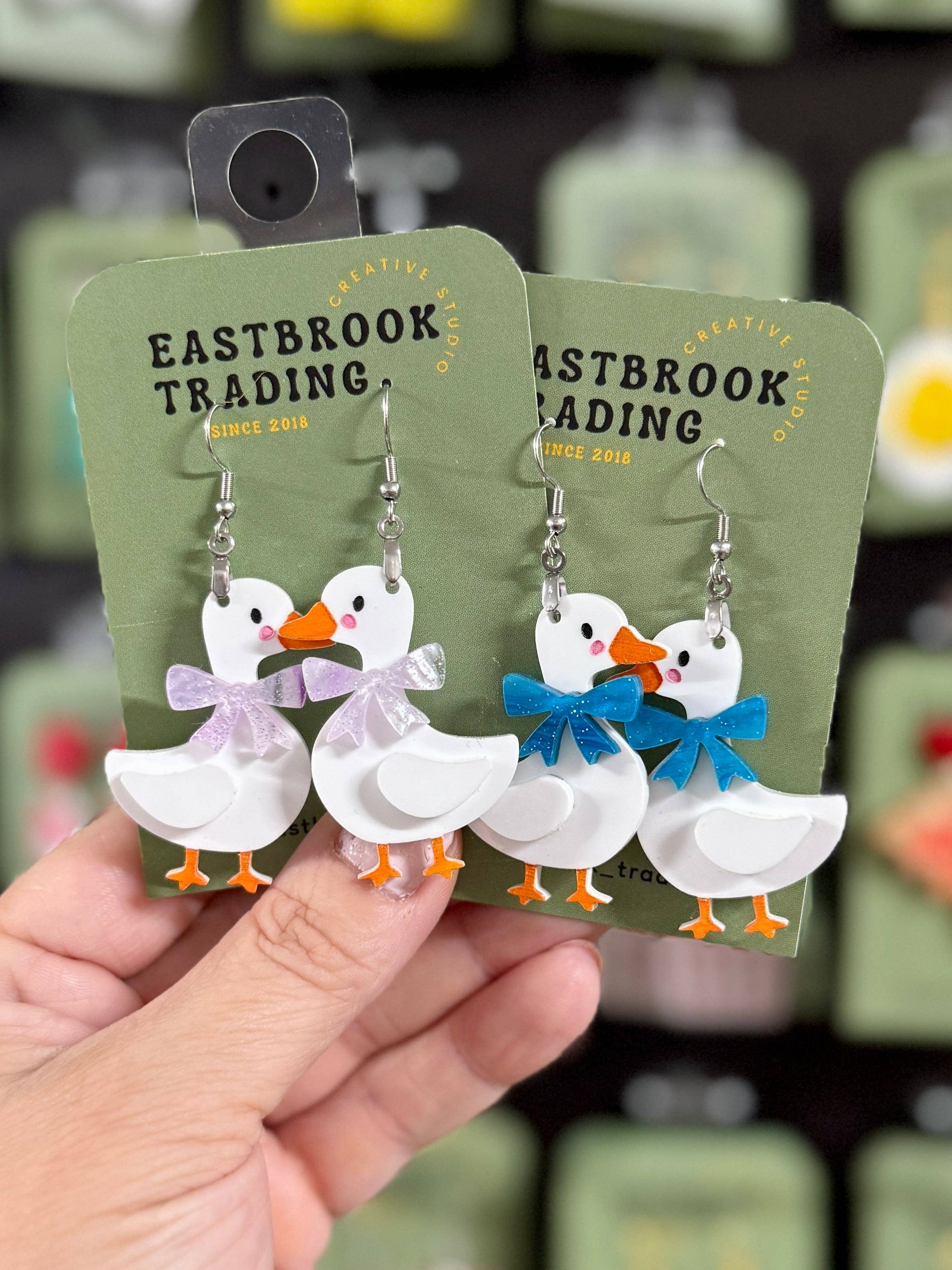 Handmade Vintage goose earrings with pink bow accents