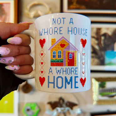 Not a whore house, a whore home mug