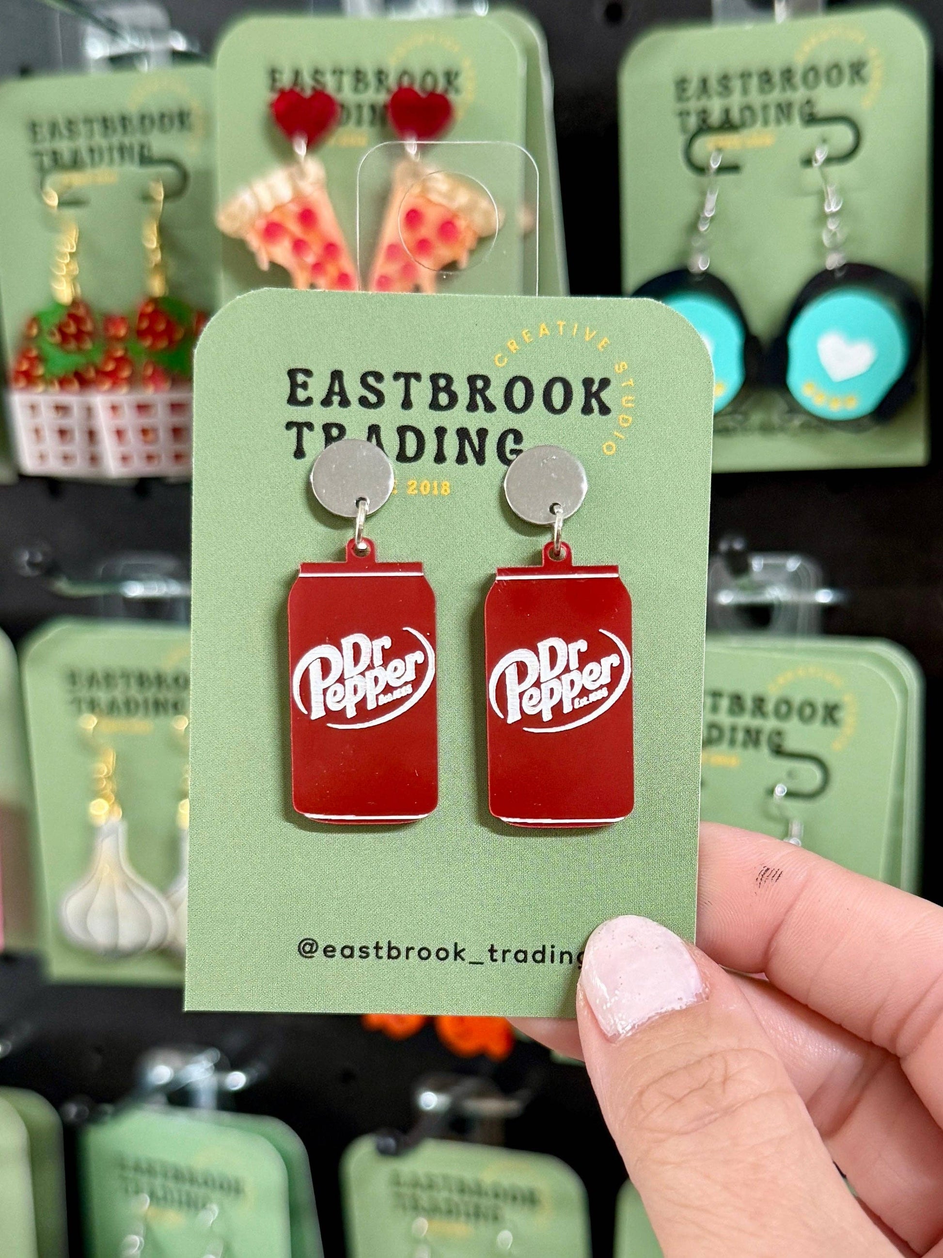 Dr. Pepper-themed earrings perfect for gifts