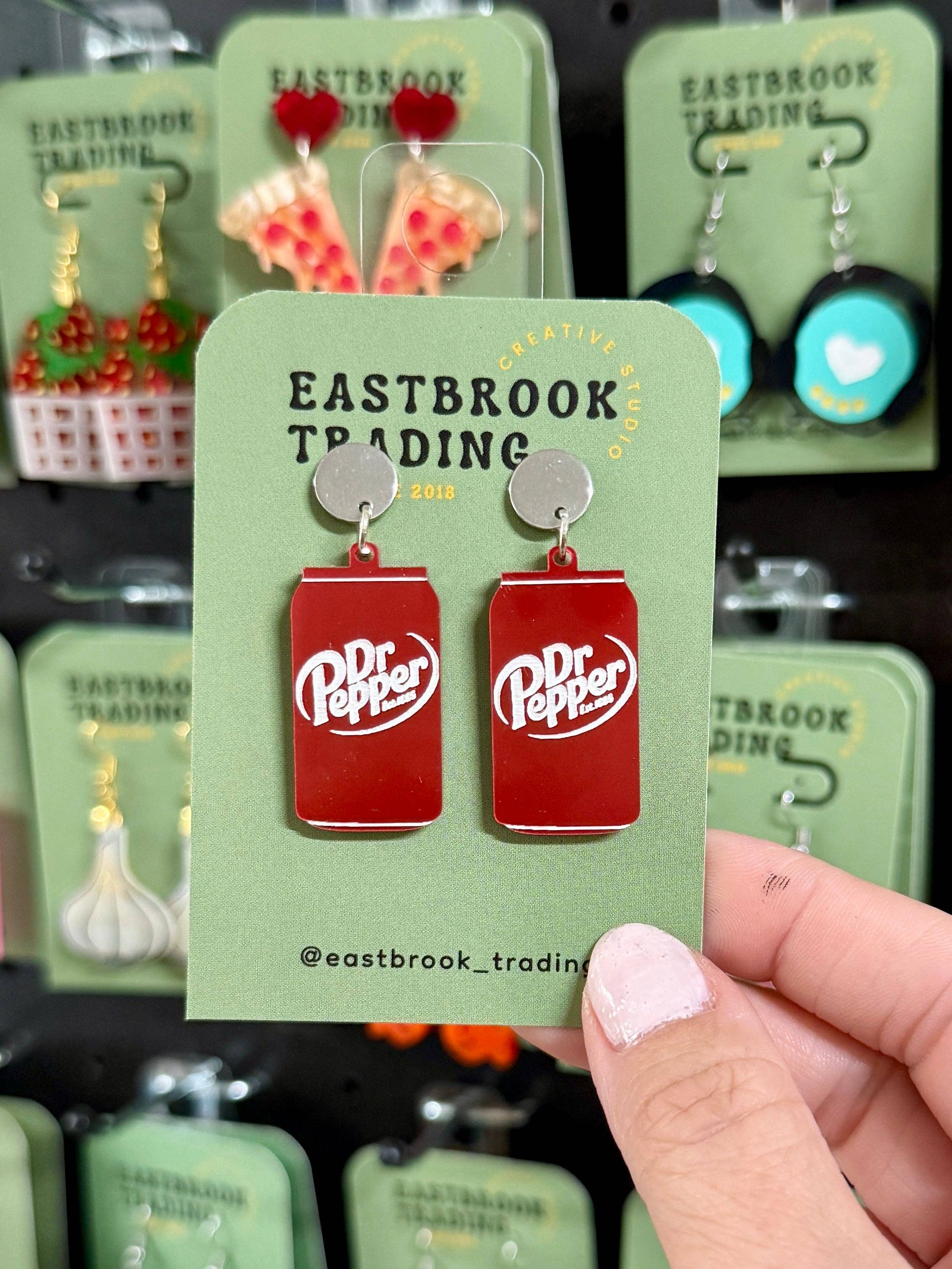 Dr. Pepper-themed earrings perfect for gifts