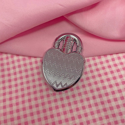 Silver heart-shaped lock lighter with flip top