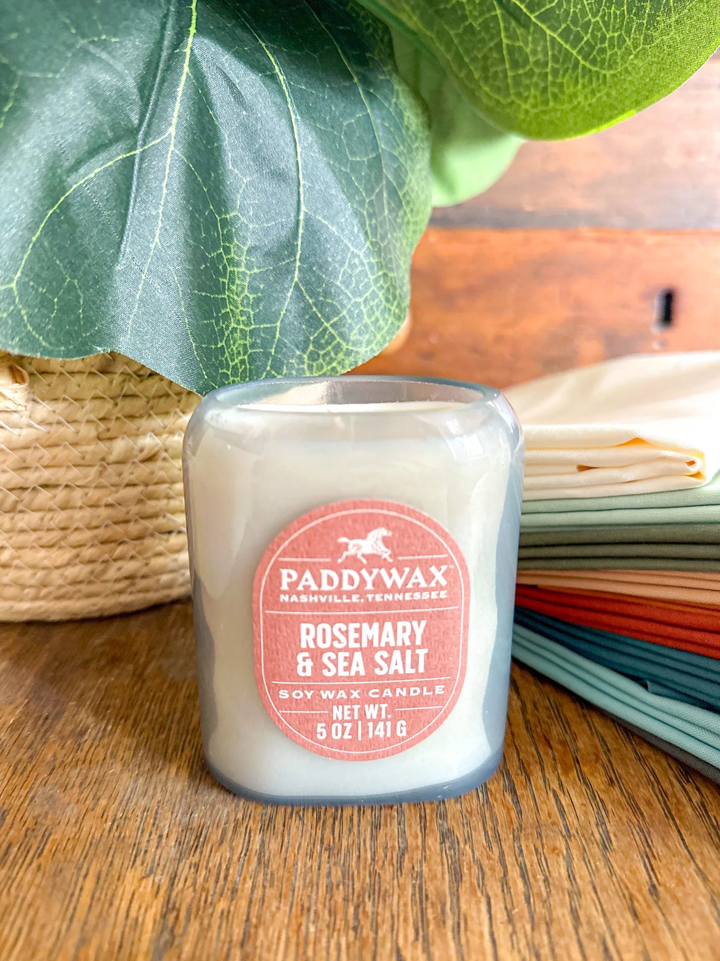 Luxury home decor candle with jasmine, rosemary, and thyme notes, great for housewarming or birthday gifts