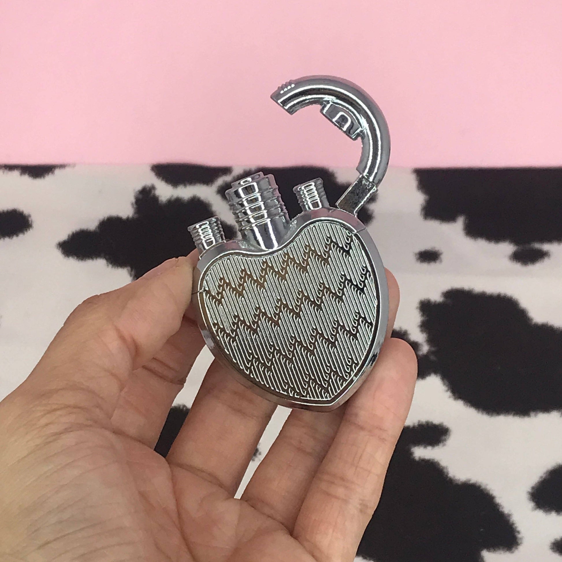 Butane refillable lighter in silver heart shape