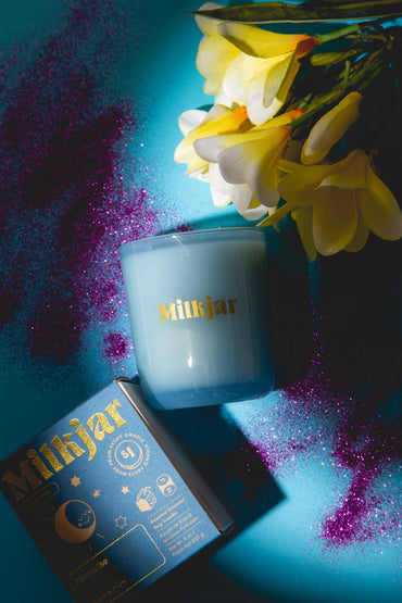 Romantic citrus and plum fragrance candle in reusable glass jar gift store