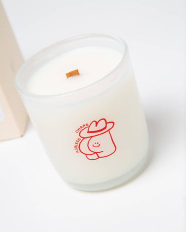 Western themed leather-scented candle in reusable glass jar gift store