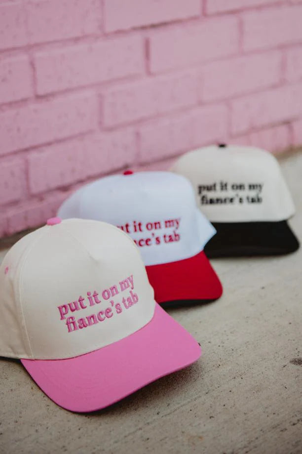 Structured fabric trucker hat with ‘Put It On My Fiancé’s Tab’ embroidery – novelty headwear for bridal parties
